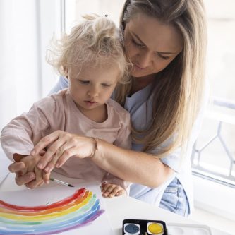 mom-painting-with-child-home