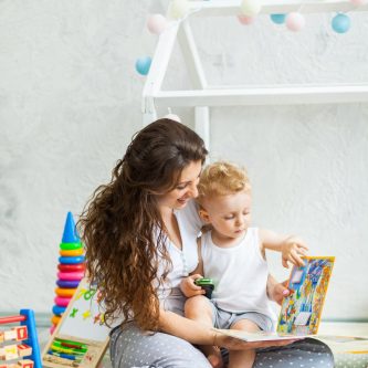 mother-her-son-play-together-indoor_114309-100